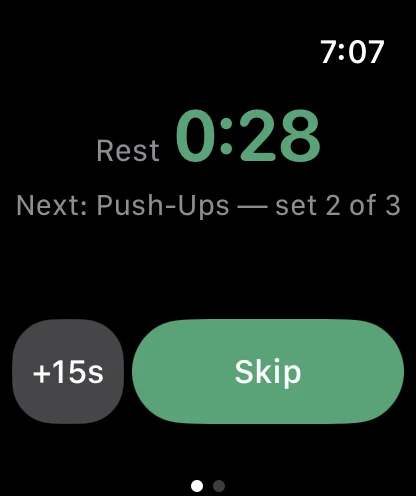 The same rest on Apple Watch at the same moment: Rest 0:22, Next Push-Ups set 2 of 3, and the same +15s and Skip controls.